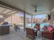 Outdoor living space featuring a covered patio, outdoor kitchen, and a sparkling swimming pool at 10446 Abbotsbury Dr, Las Vegas, NV 89135