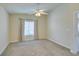 Bedroom with neutral carpet and a large window for natural light and outside views at 1092 Slate Crossing Ln # 1, Henderson, NV 89002