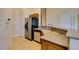 Kitchen featuring stainless steel appliances and wood cabinets under recessed lighting at 1092 Slate Crossing Ln # 1, Henderson, NV 89002