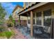 Covered patio offers an outdoor seating area, perfect for relaxing and enjoying the backyard at 1209 Padre Serra Ln, Las Vegas, NV 89134