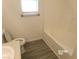 Well-lit bathroom with a bathtub and single sink at 1401 N Michael Way # 239, Las Vegas, NV 89108