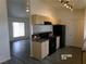 Modern kitchen with stainless steel appliances, plenty of storage, and view into living room at 1401 N Michael Way # 239, Las Vegas, NV 89108