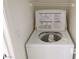 This laundry area includes a top-load washing machine at 1401 N Michael Way # 239, Las Vegas, NV 89108