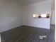 Spacious living room with view into the adjacent kitchen at 1401 N Michael Way # 239, Las Vegas, NV 89108