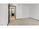 Bedroom featuring neutral carpet and a view of a secondary room at 1405 Vegas Valley Dr # 286, Las Vegas, NV 89169