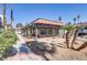 Exterior shot of the community center with terracotta roofing and lush landscaping at 1405 Vegas Valley Dr # 286, Las Vegas, NV 89169