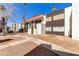 Apartment complex with tiled roof, brown accents and light colored walls with landscaping and walkways at 1405 Vegas Valley Dr # 286, Las Vegas, NV 89169