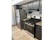 Stainless steel refrigerator and gas range stove in an updated kitchen at 1405 Vegas Valley Dr # 286, Las Vegas, NV 89169