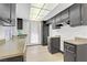 A bright kitchen featuring dark cabinetry, modern fixtures, and ample countertop space at 1405 Vegas Valley Dr # 286, Las Vegas, NV 89169