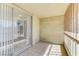 Private patio with neutral tile flooring and glass sliding door at 1405 Vegas Valley Dr # 286, Las Vegas, NV 89169