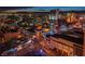 Aerial night view of a dynamic city with illuminated streets and commercial buildings at 150 Las Vegas Blvd # 1608, Las Vegas, NV 89101