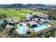 Aerial view of resort amenities featuring a pool, clubhouse, and golf course at 16 Via Visione # 101, Henderson, NV 89011