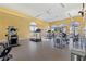 Well-equipped gym with treadmills, elliptical machine, weights, and multiple machines for strength training at 16 Via Visione # 101, Henderson, NV 89011