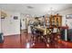 Dining area showcasing hardwood floors, stylish furnishings, and easy access to the kitchen at 1939 Dry Falls St, Las Vegas, NV 89142