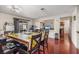 Dining area featuring hardwood floors, table with yellow table cloth, and access to other rooms at 1939 Dry Falls St, Las Vegas, NV 89142