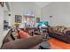 Cozy living room with comfortable seating, hardwood flooring, natural light, and decorative touches at 1939 Dry Falls St, Las Vegas, NV 89142