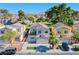 Aerial view of a neighborhood showcasing the property's manicured lawn and proximity to local parks at 2032 Jesse Scott St, Las Vegas, NV 89106