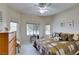 Bright bedroom features a large window, providing natural light and serene outdoor views at 2035 King Mesa Dr, Henderson, NV 89012