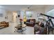 A cozy living room featuring comfortable seating, neutral walls, and ample natural light at 2035 King Mesa Dr, Henderson, NV 89012