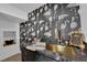 Close-up of elegant bar area featuring gold fixtures and flamingo wallpaper at 2160 Pueblo Cir, Las Vegas, NV 89169