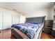 Bedroom featuring neutral walls, wood floors, and a closet at 2291 Grannis Ln, Las Vegas, NV 89104