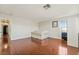 Bedroom with hardwood flooring, a window, and television at 2291 Grannis Ln, Las Vegas, NV 89104