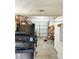 Spacious garage with ample storage shelves and standard roll-up door at 2609 Sierra Madre Dr, Las Vegas, NV 89102