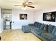 Comfortable living room with a large sectional sofa and a view into the adjacent kitchen at 2609 Sierra Madre Dr, Las Vegas, NV 89102