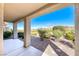 Back porch that overlooks landscaped yard and beautiful golf course with lots of light at 2702 Grand Forks Rd, Henderson, NV 89052