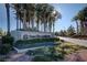 Entrance to the community Sun City Anthem with a monument sign and mature landscaping at 2728 Goldcreek St, Henderson, NV 89052