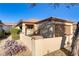 Attractive single-story home with a well-maintained front yard, decorative wall, and attached garage at 2728 Goldcreek St, Henderson, NV 89052