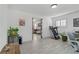 Modern flex room, featuring a sliding barn door, with a view of living room at 2728 Goldcreek St, Henderson, NV 89052