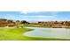 Scenic golf course and community view with pond at 2728 Goldcreek St, Henderson, NV 89052