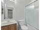 Bathroom featuring a vanity and shower with glass doors at 3009 Little Crimson Ave, North Las Vegas, NV 89081