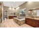 Elegant bathroom with a large soaking tub and natural light at 32 Hunting Horn Dr, Las Vegas, NV 89135