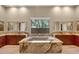 Luxurious bathroom featuring a soaking tub and marble countertops at 32 Hunting Horn Dr, Las Vegas, NV 89135