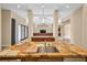 Spacious kitchen island features a unique countertop and modern pendant lighting at 32 Hunting Horn Dr, Las Vegas, NV 89135