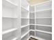 Walk-in pantry with custom shelving and ample storage space at 32 Hunting Horn Dr, Las Vegas, NV 89135