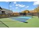 Outdoor pickleball court with vibrant green and blue surface, perfect for community recreation and sunny day fun at 32 Hunting Horn Dr, Las Vegas, NV 89135