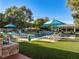 Luxurious pool area with ample seating and a relaxing cabana at 330 Rancho Cir, Las Vegas, NV 89107