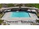 Overhead shot of a refreshing community pool with lounge chairs, offering a relaxing recreational space at 371 Silva Pl, Henderson, NV 89011