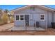 Enclosed backyard with patio, gate, and access to the home, ensuring privacy at 432 Bonelli Ave, Overton, NV 89040