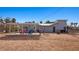 Exterior showcasing a backyard with covered patio, seating and entertaining space at 432 Bonelli Ave, Overton, NV 89040