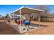 Backyard featuring a covered patio with seating, grill, and room to relax at 432 Bonelli Ave, Overton, NV 89040