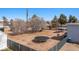 Spacious backyard showcasing a trampoline and a covered patio area for outdoor fun at 432 Bonelli Ave, Overton, NV 89040