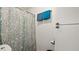 Bathroom featuring a shower-tub combo with decorative curtain at 432 Bonelli Ave, Overton, NV 89040