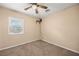 Neutral bedroom featuring a ceiling fan and a window at 432 Bonelli Ave, Overton, NV 89040