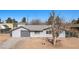 A single-story home with gray siding, a metal roof, and minimal landscaping at 432 Bonelli Ave, Overton, NV 89040