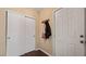 Entryway with a closet, coat rack, and view into other living spaces at 432 Bonelli Ave, Overton, NV 89040