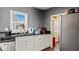 Kitchen with stainless steel dishwasher and sink beneath a window at 432 Bonelli Ave, Overton, NV 89040
